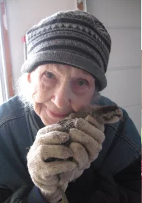 woman holding animal